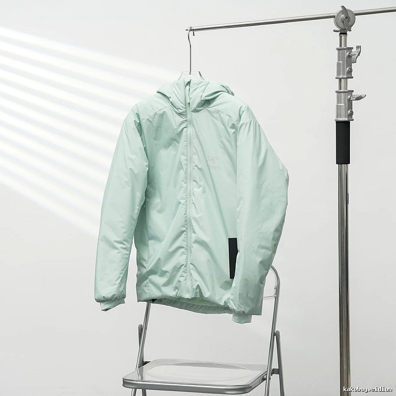 Clean Hooded Profile And Minimal Chest Branding Arc'teryx Lightweight Shell Jacket in Mint Green