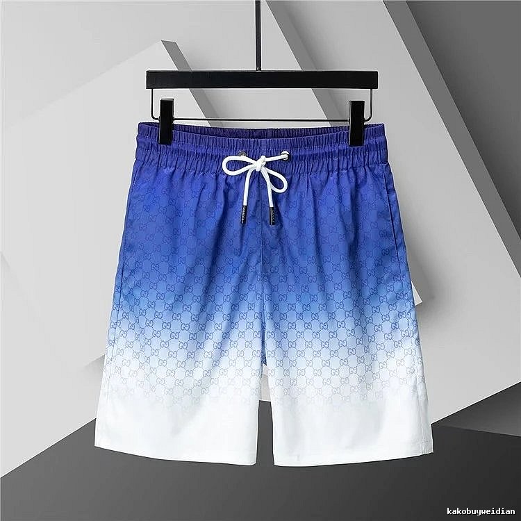 Gucci gradient-style blue and white shorts
