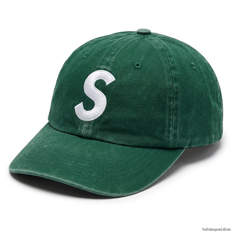 Vintage-style green hat with Supreme letters